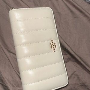 there are 3 small scuffs, this girl is so cute. great condition.